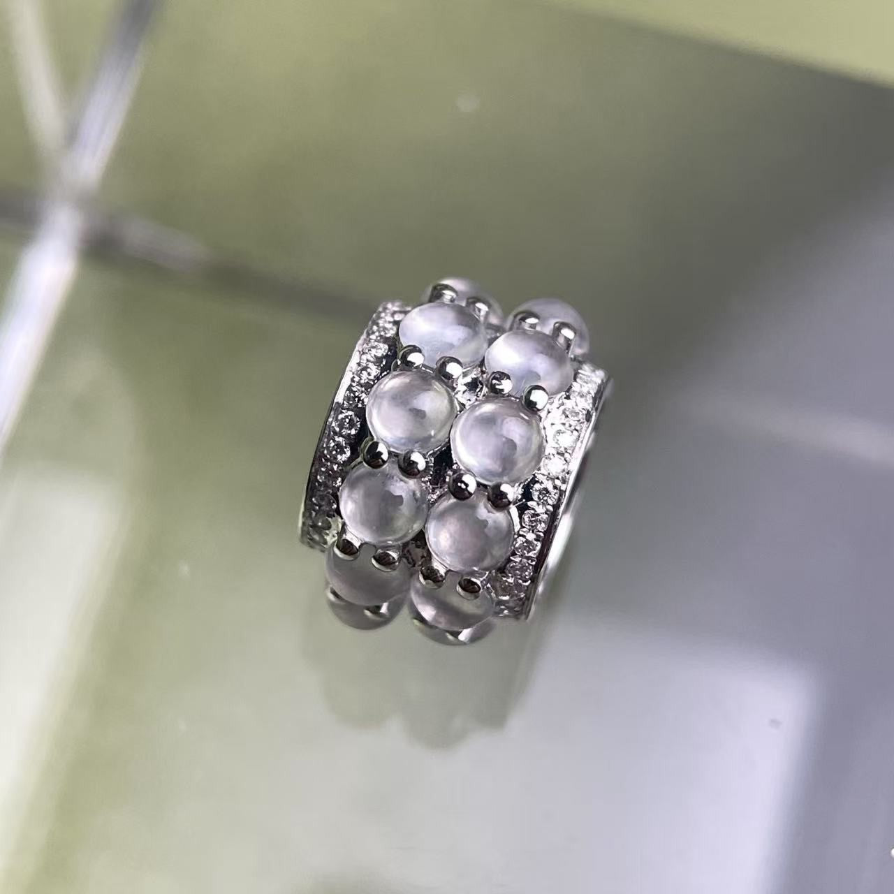 Sylvia Jewelry 18k white gold cylinder charm featuring double-row icy jadeite beads and micro-pavé diamond accents.