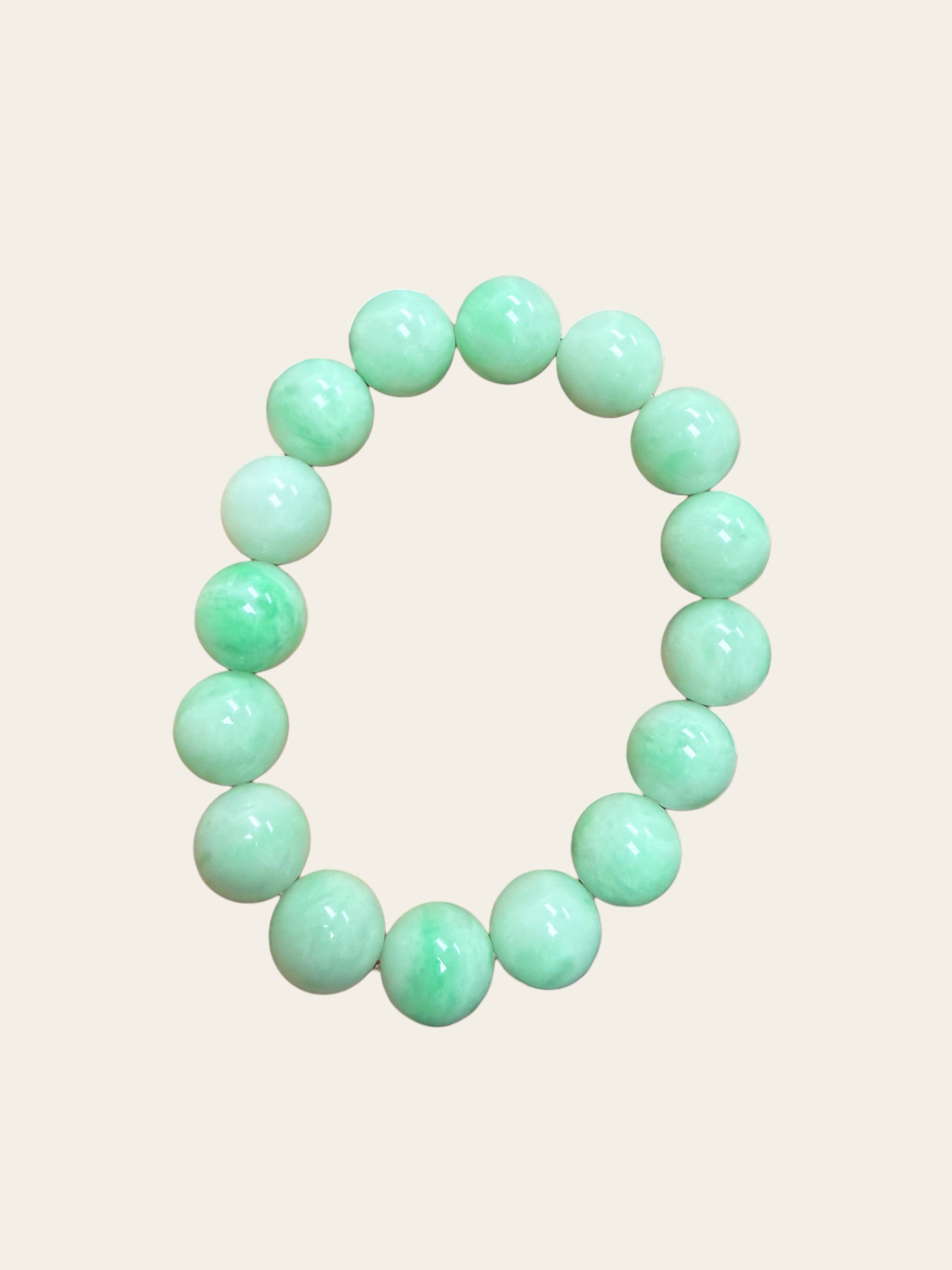 Sylvia Jewelry Radiant Spring bracelet featuring translucent icy Grade-A jadeite beads with natural floating green streaks.