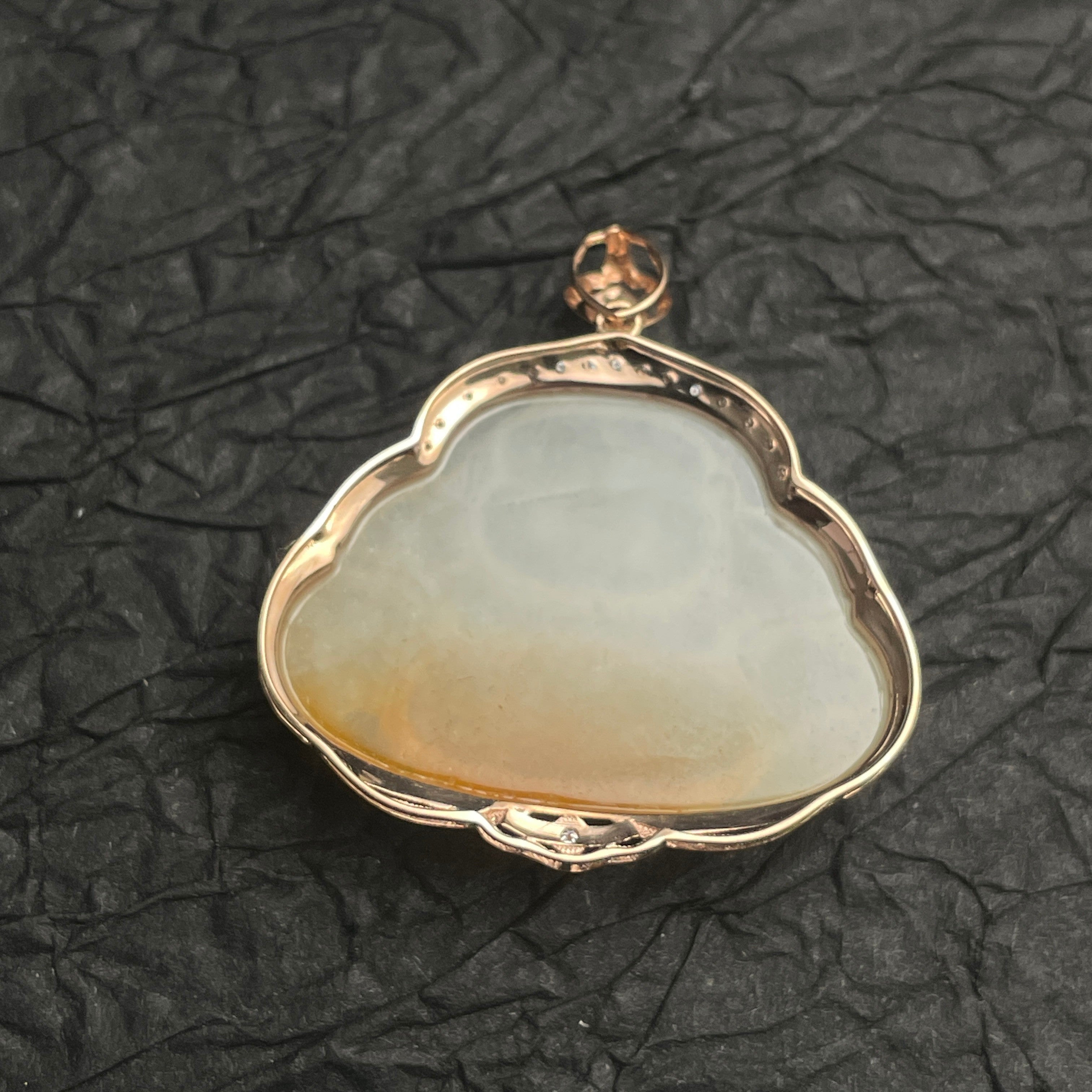 Sylvia Jewelry yellow and white jadeite Laughing Buddha pendant in 18k rose gold with pavé diamond accents.