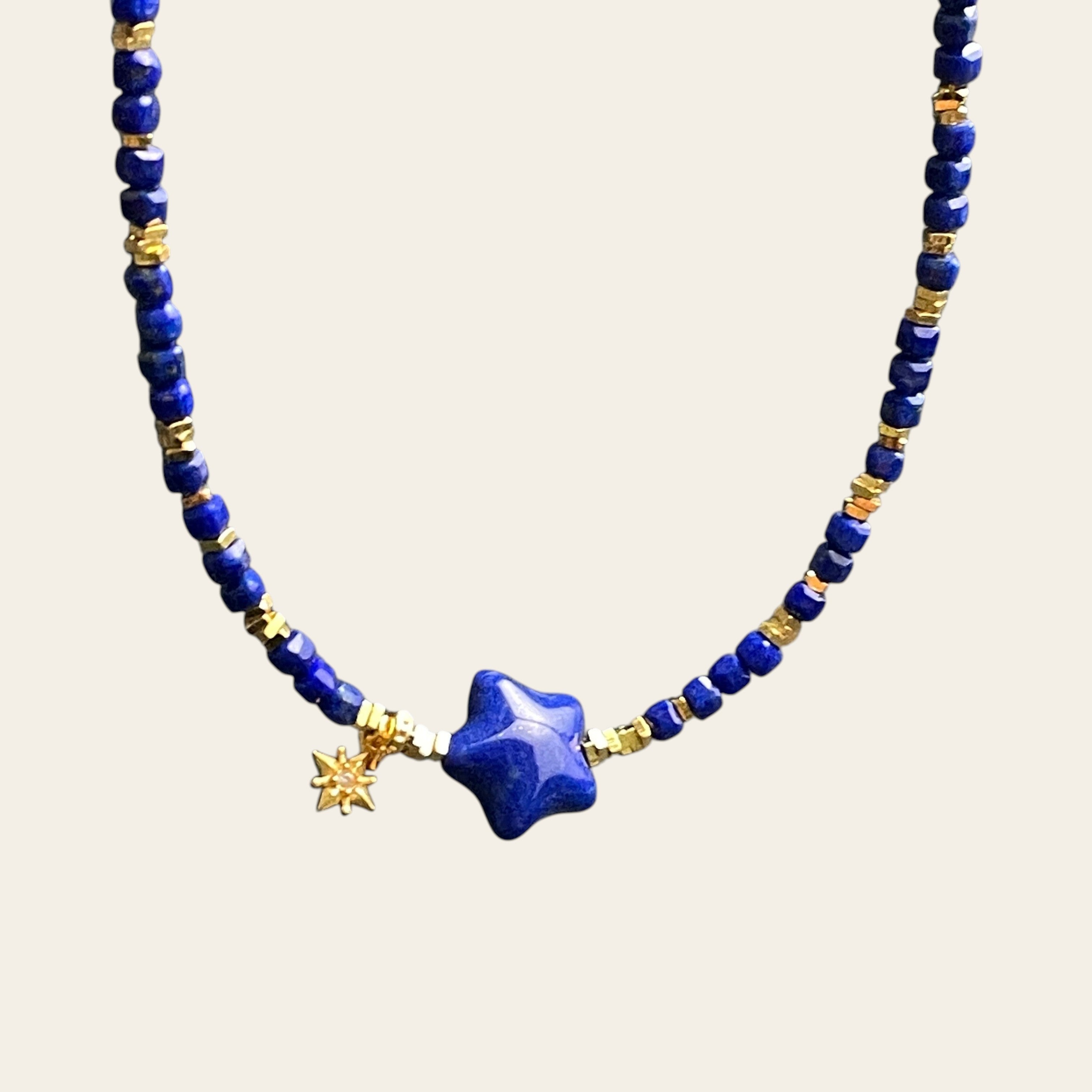 Sylvia Jewelry Celestial Night choker with royal blue lapis lazuli beads, gold-plated silver spacers, and star charm.