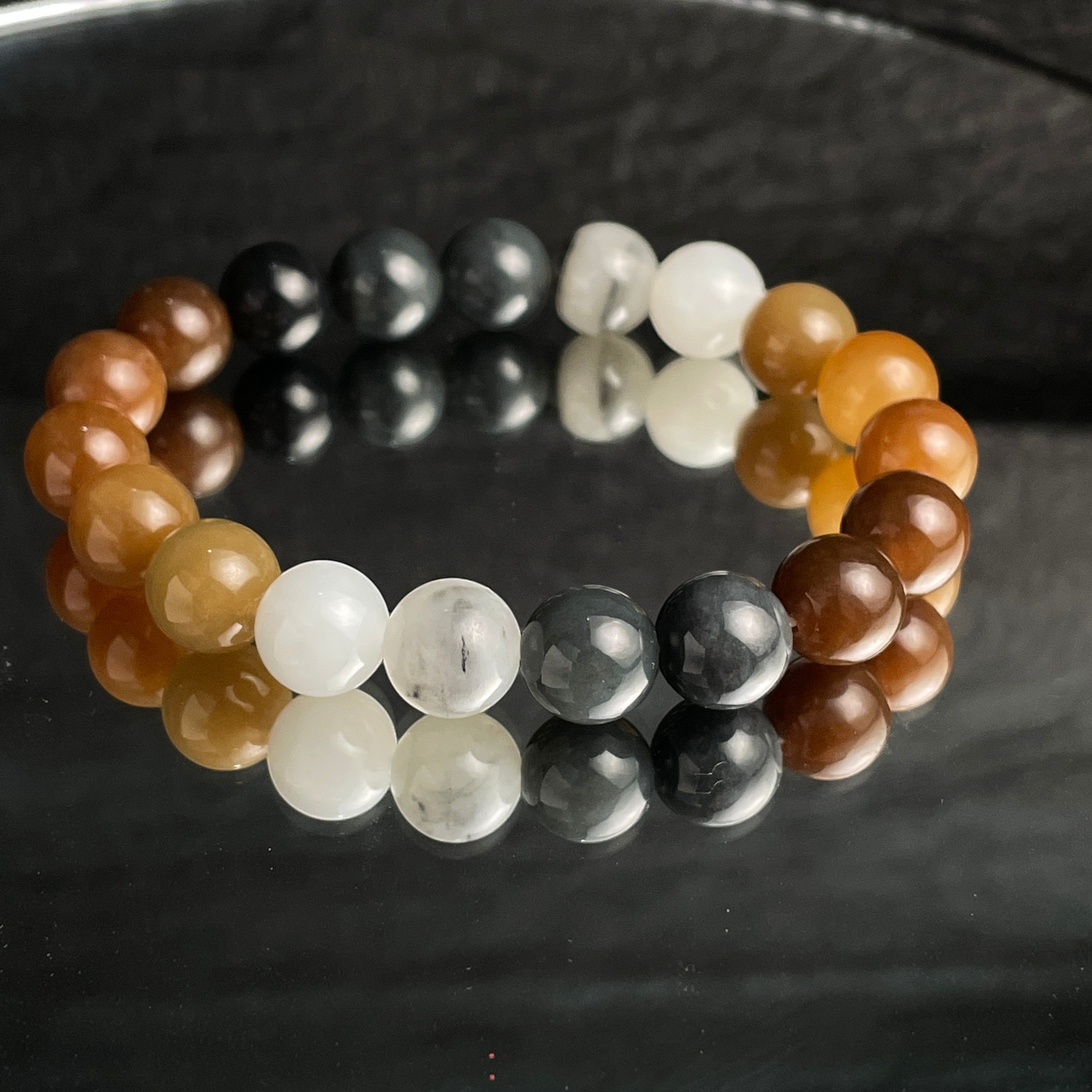 Sylvia Jewelry multi-colored Hetian nephrite jade bead bracelet with a smooth, greasy luster and gradient earth tones.