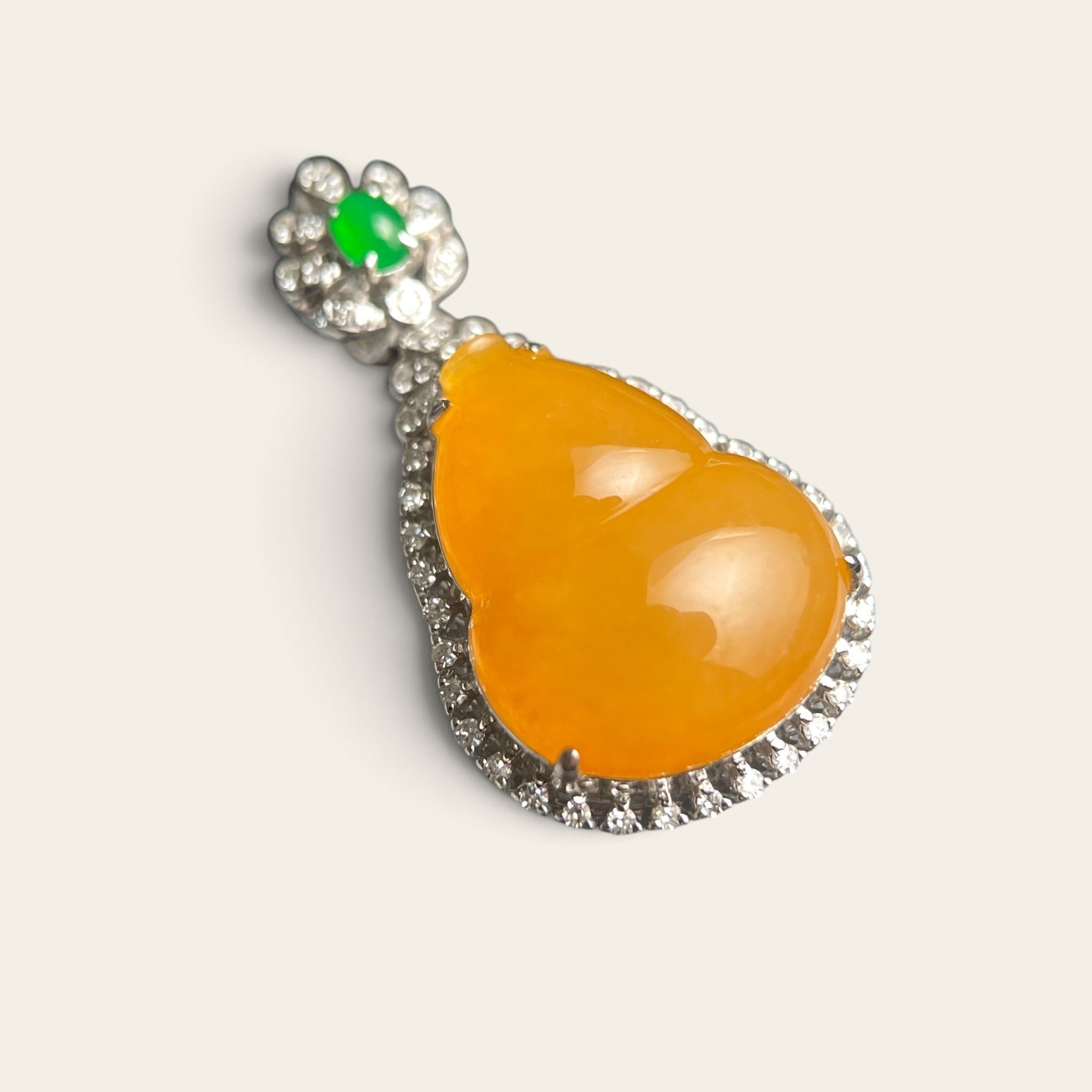 Sylvia Jewelry natural orange jadeite gourd pendant with green jade accent and 18K gold diamond setting
