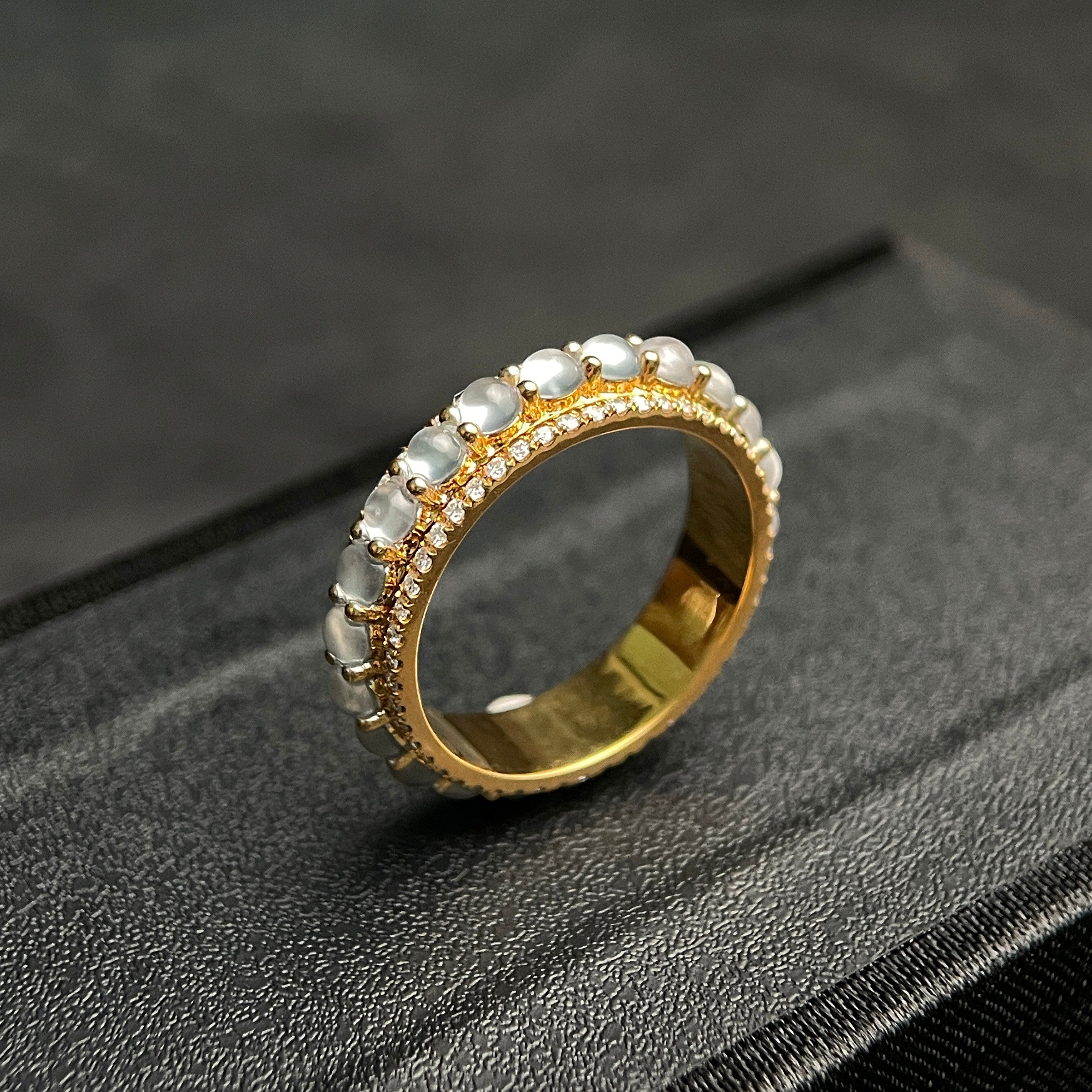 Sylvia Jewelry 18K gold ring with rotating white jadeite cabochons and small diamonds