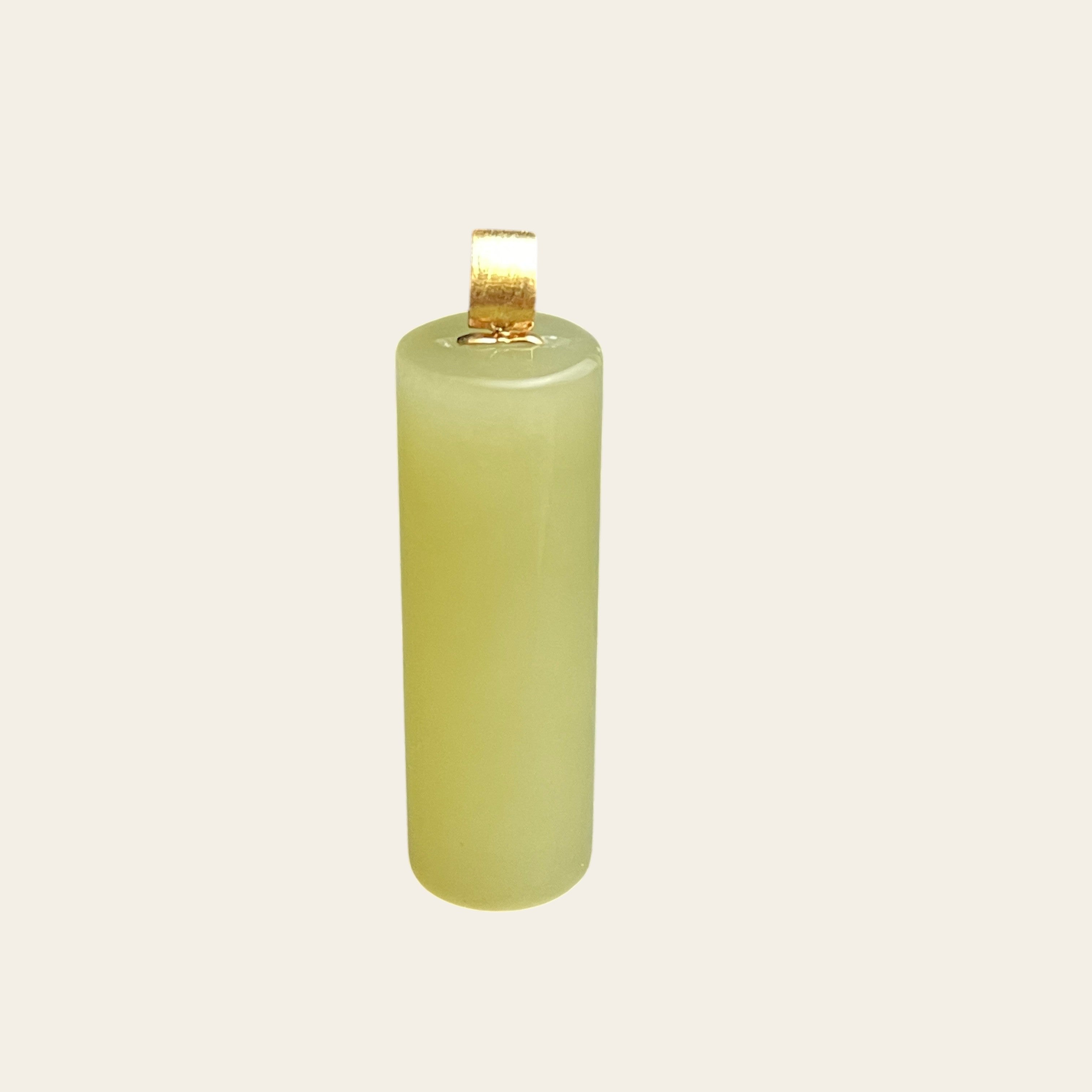 Sylvia Jewelry pale yellow Hetian jade cylinder pendant with a gold-plated bail on a neutral background.