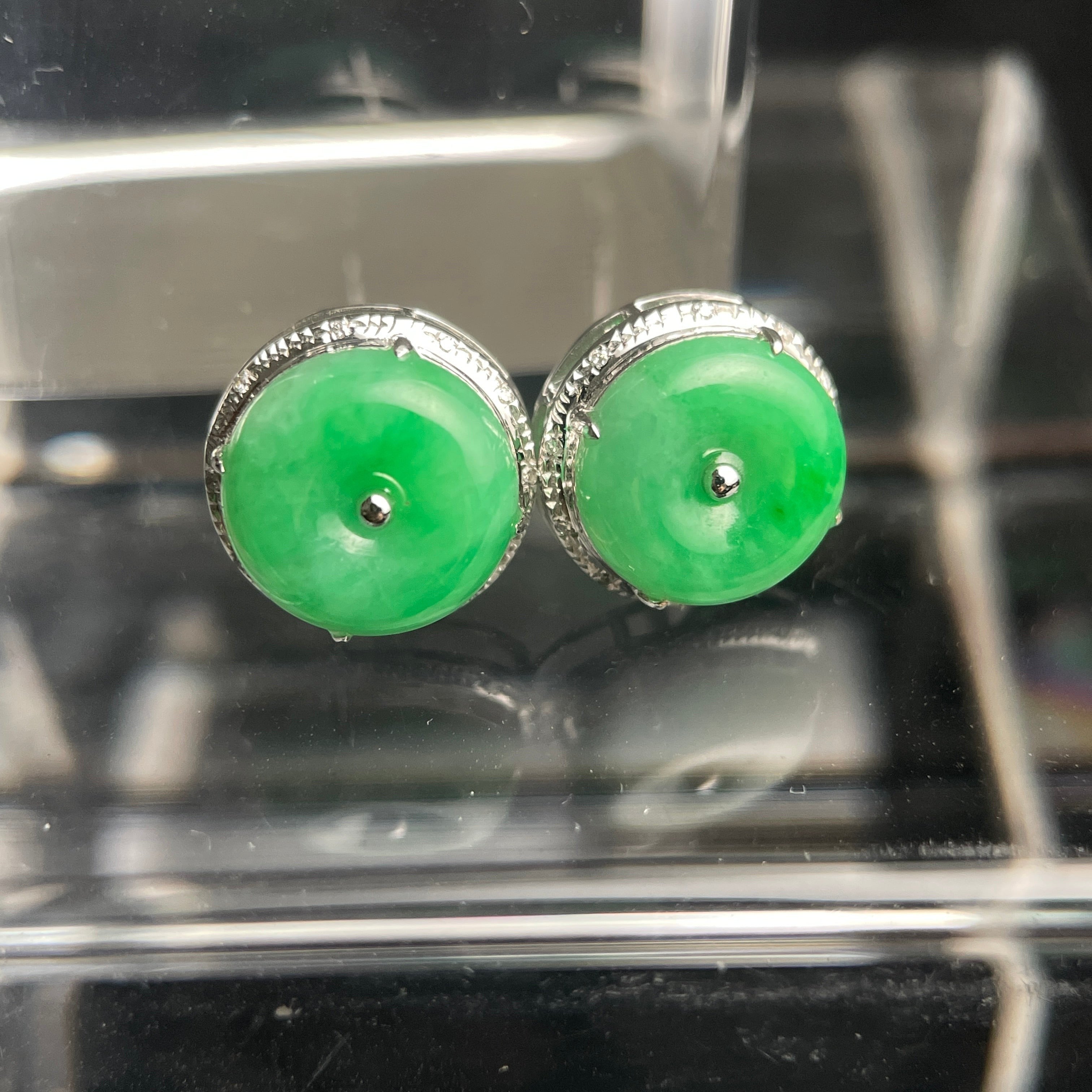 Vivid green jadeite disc stud earrings in silver-tone textured settings
